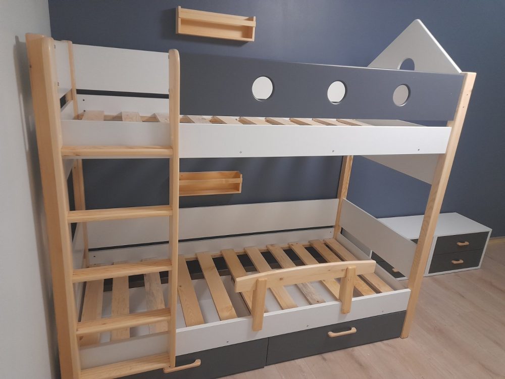 double bed with dark grey white and natural wood