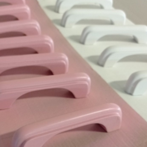 handmade wooden handles painted in pink and white children room furniture